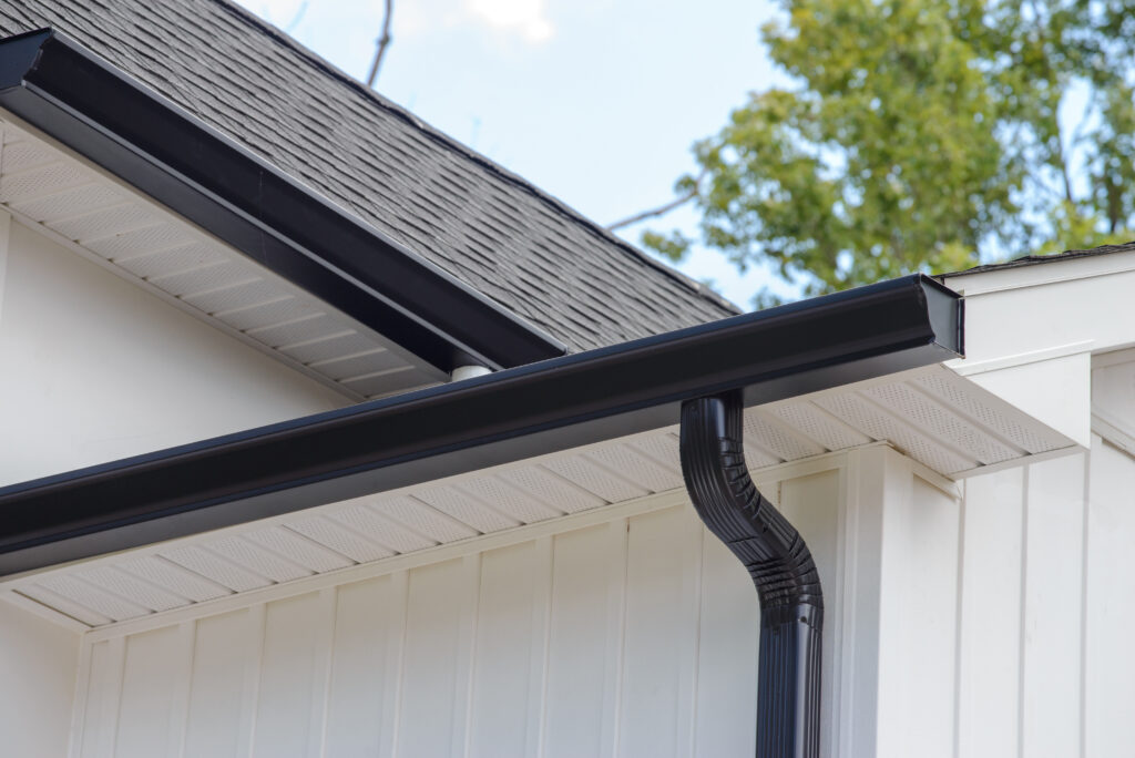 image of rain gutter of roof with downpipe