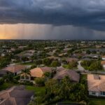 Brandon Florida homeowner inspecting residential roof before hurricane season