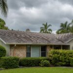 Aging asphalt shingle roof on a Florida home in the Brandon Tampa Bay area before hurricane season
